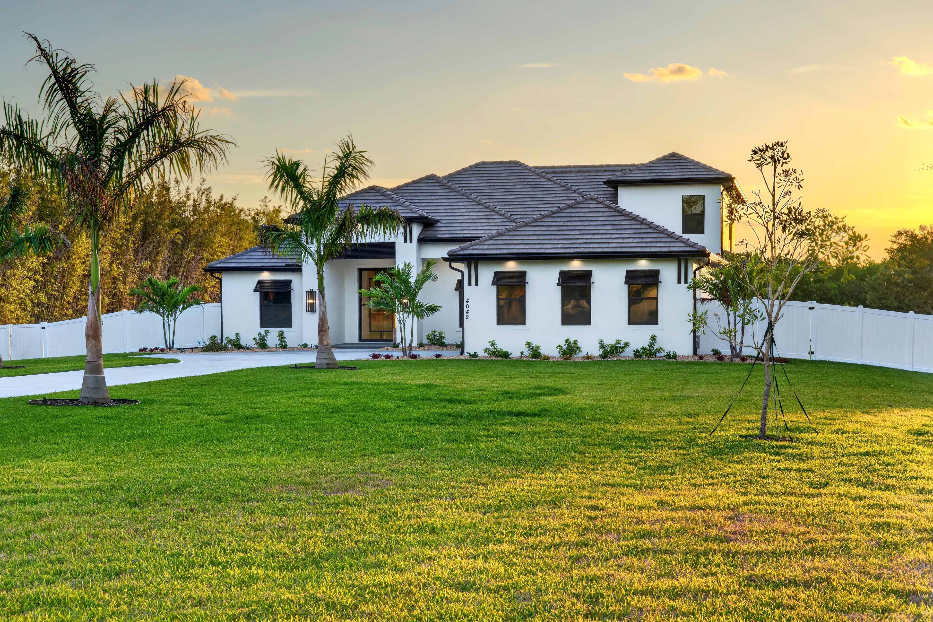 Twilight exterior listing photo with warm lighting